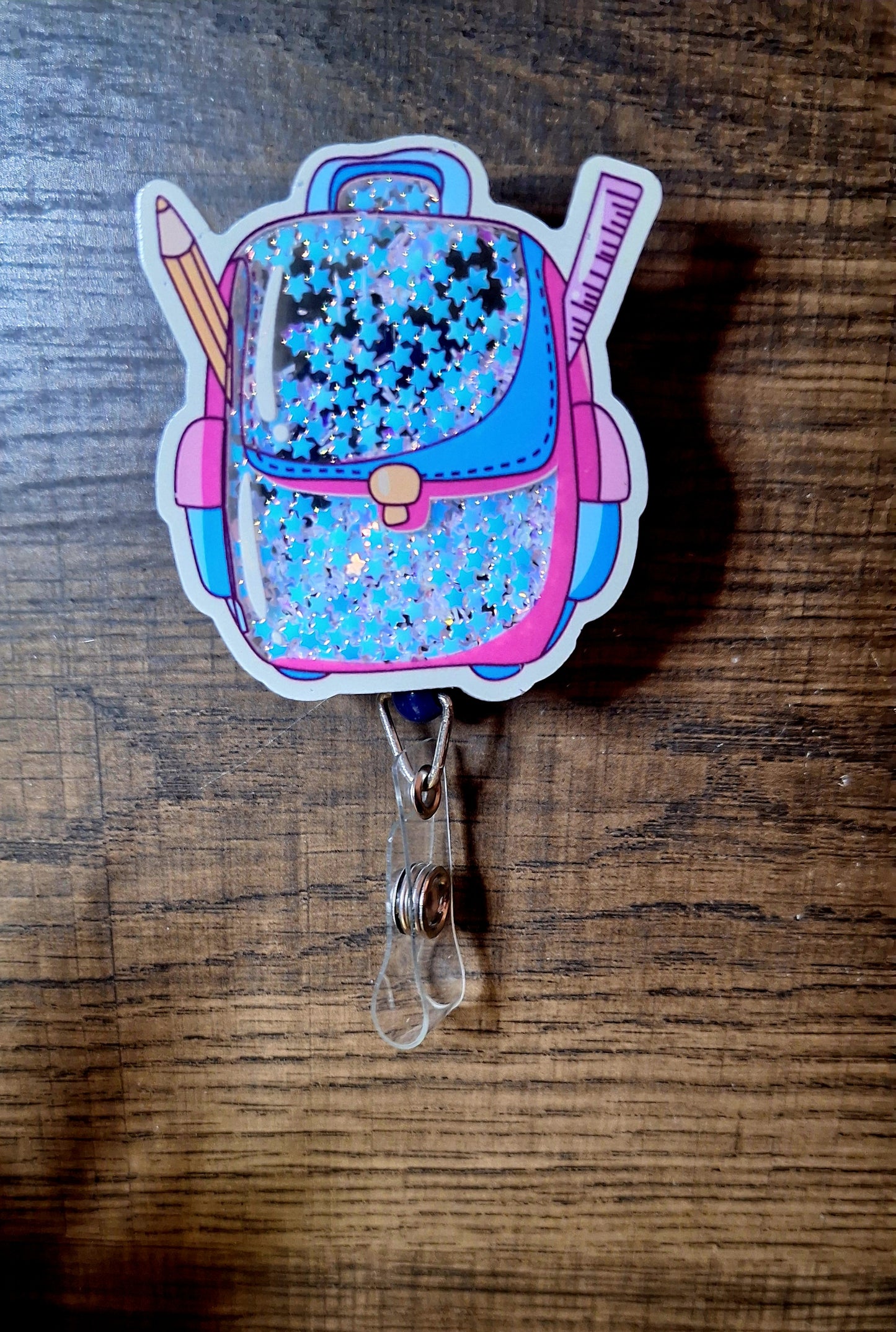 Backpack (Shaker) (Badge Reel)