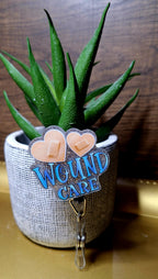 Woune Care (Badge reel)