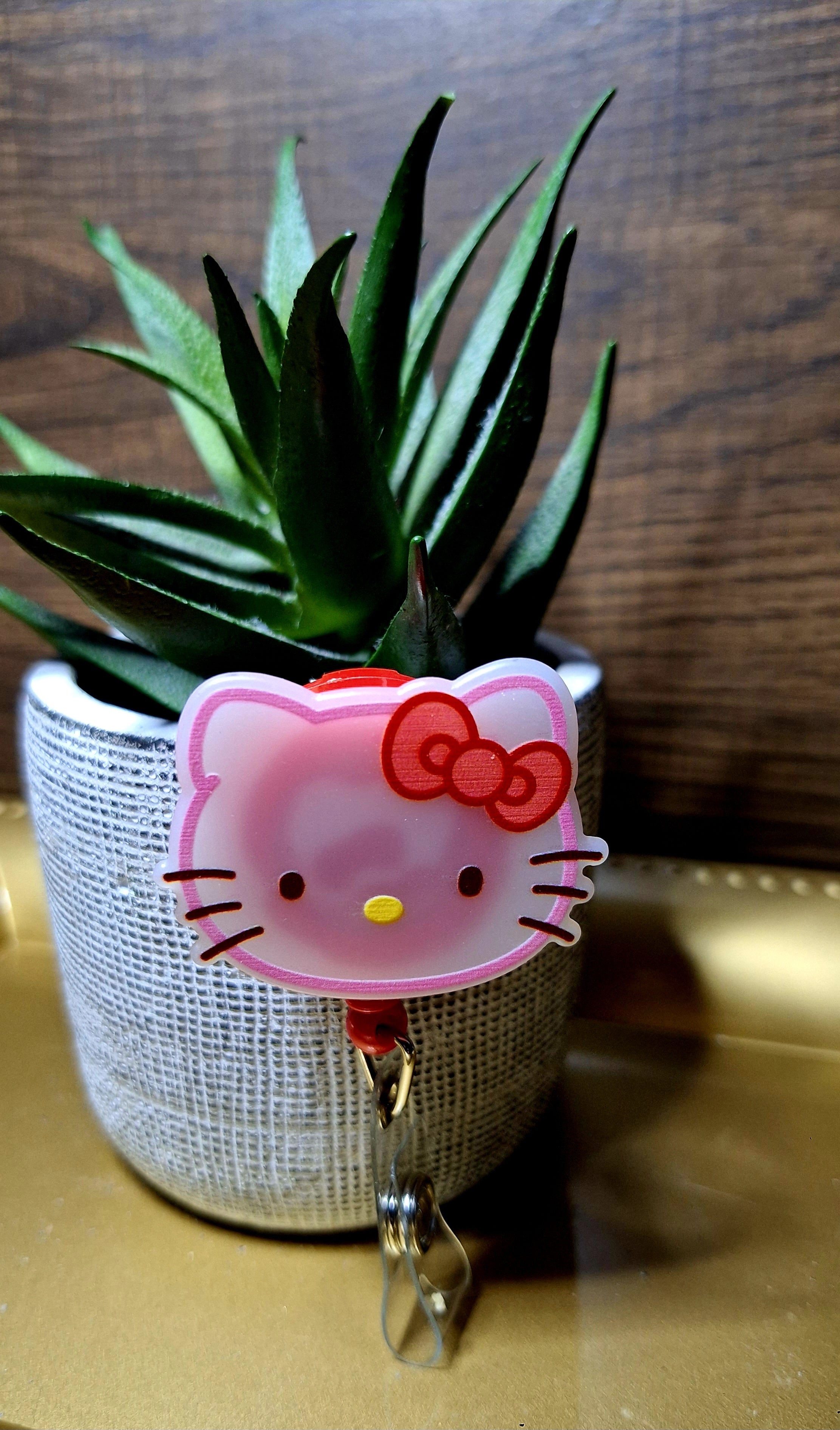Hello Kitty (Badge Reel)