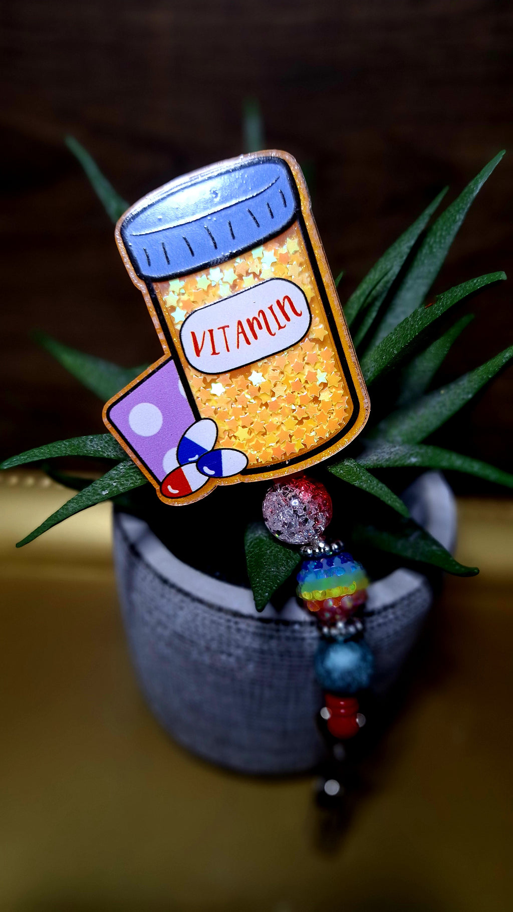 Vitamin Check (Shaker) (Badge Reel)