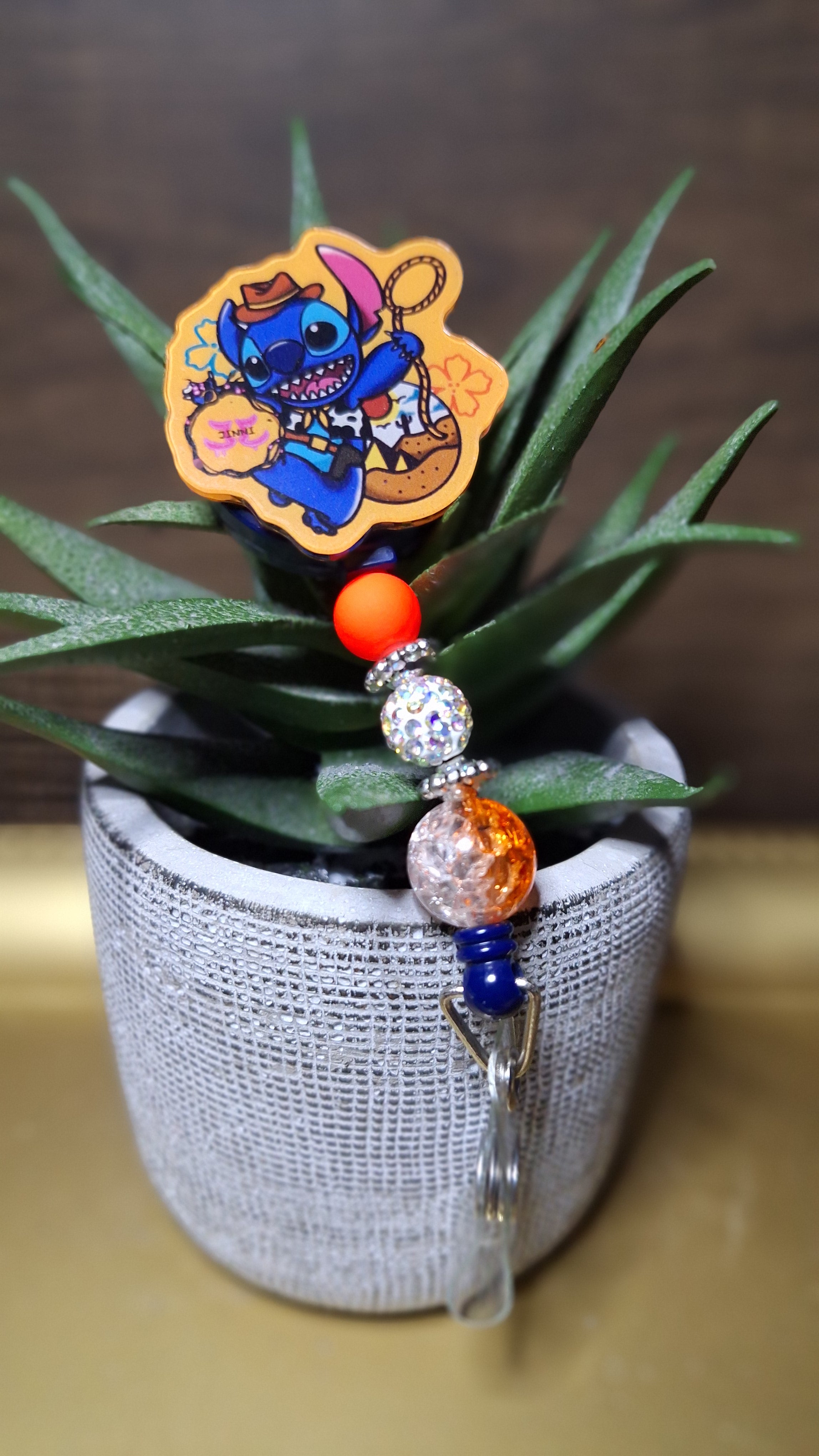 Rodeo Stitch (Orange) (Badge Reel)