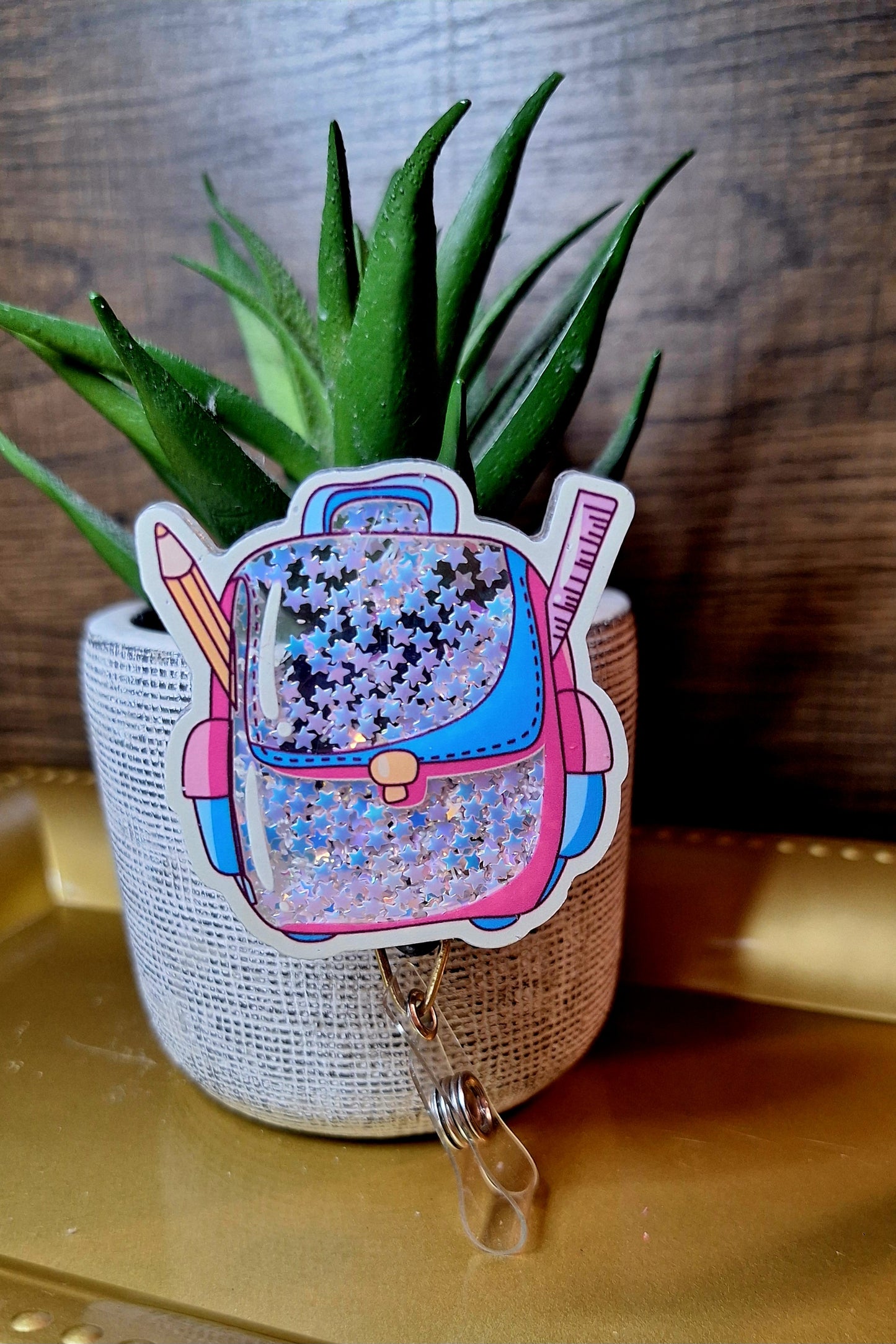 Backpack (Shaker) (Badge Reel)