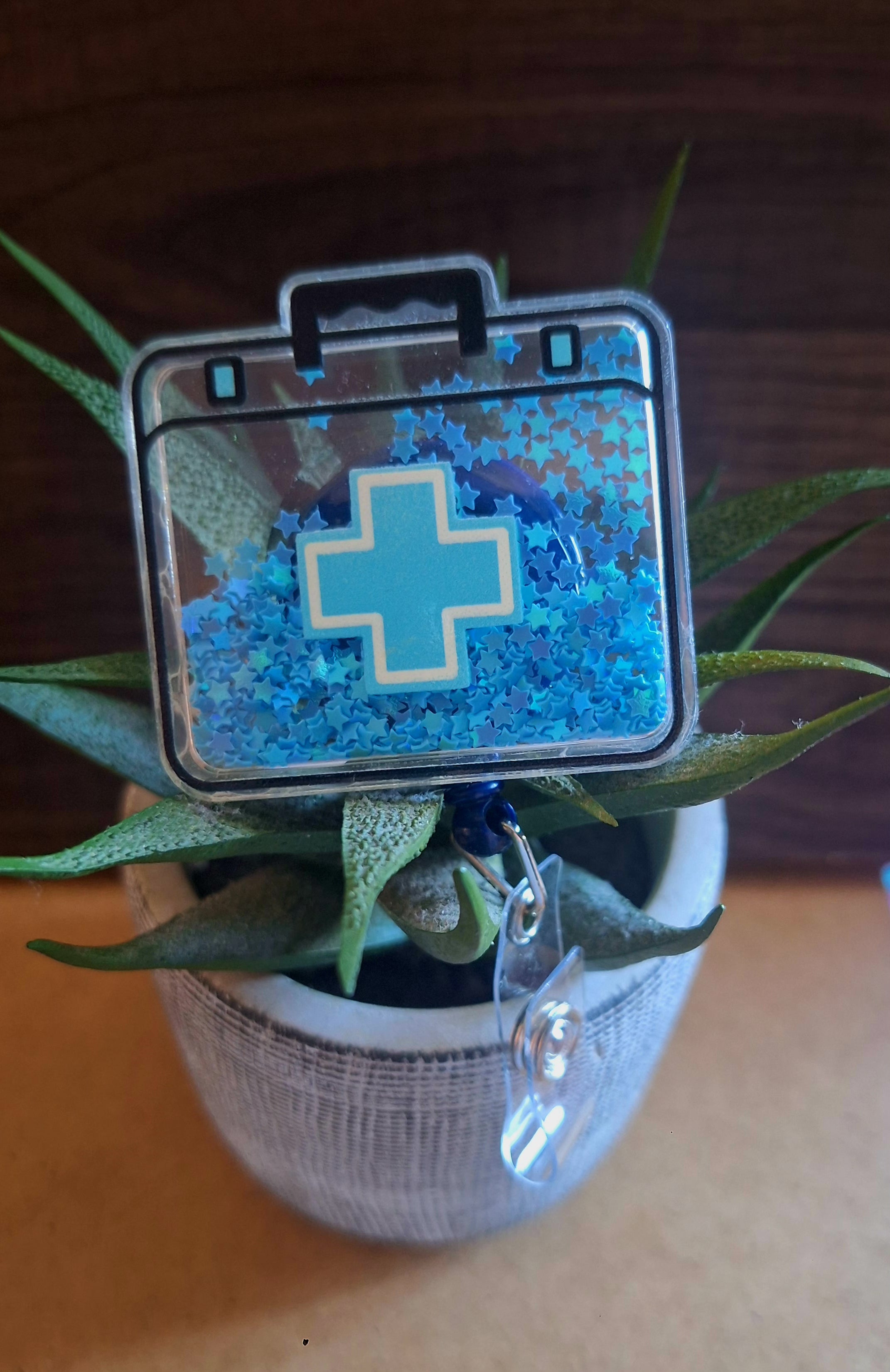 First Aid (Shaker)(Badge reel}