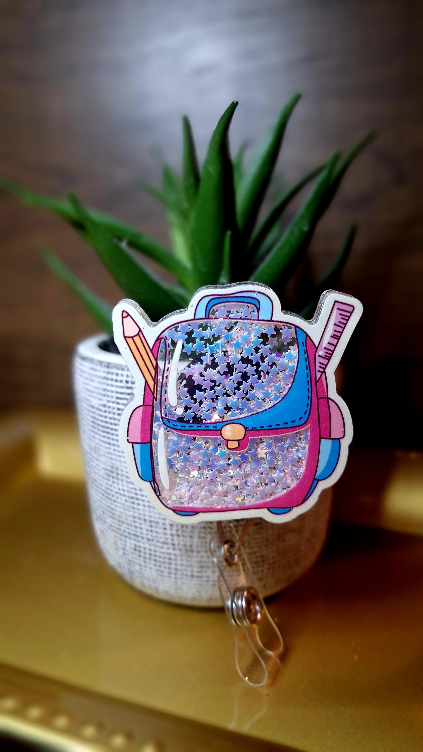 Backpack (Shaker) (Badge Reel)
