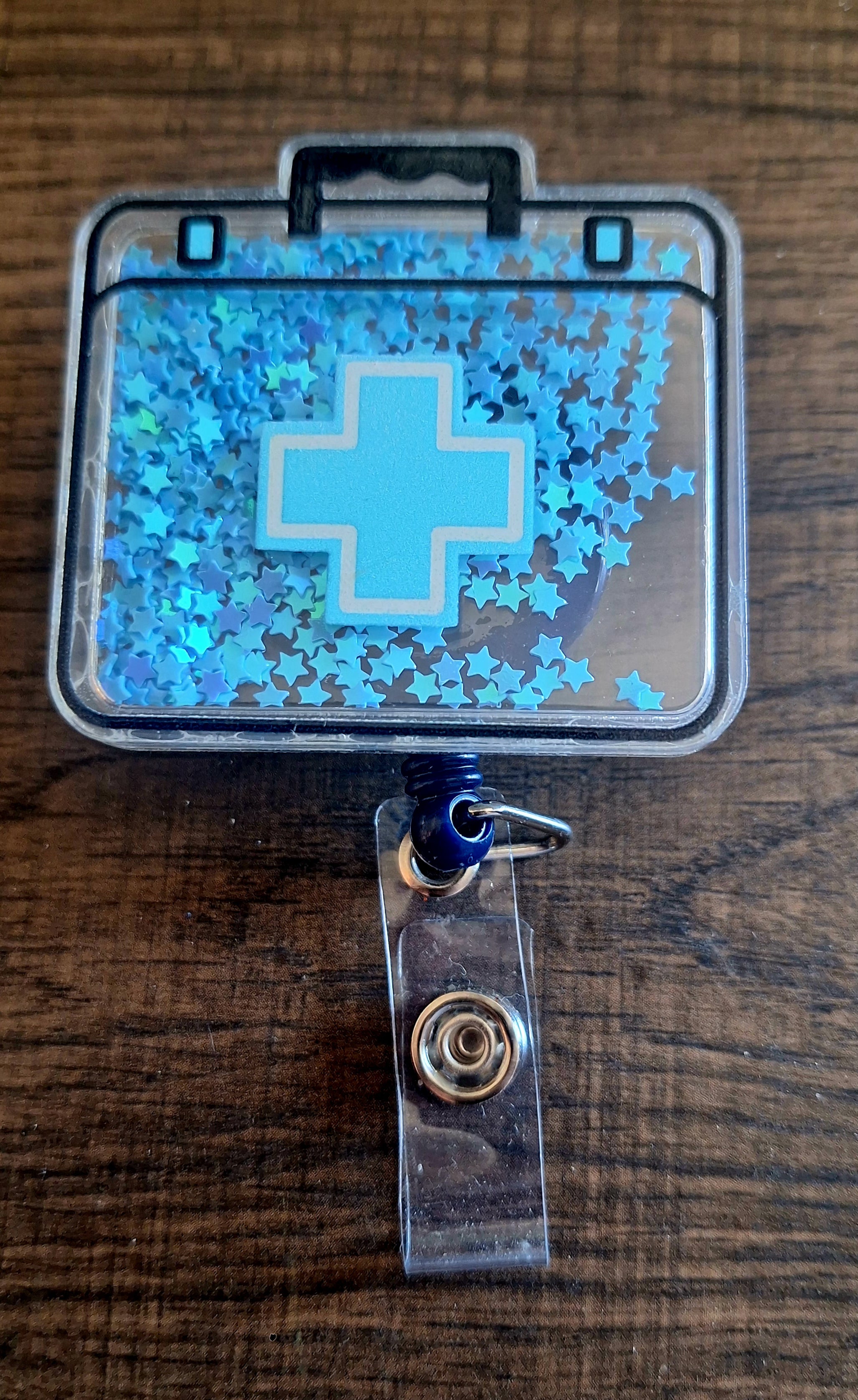 First Aid (Shaker)(Badge reel}